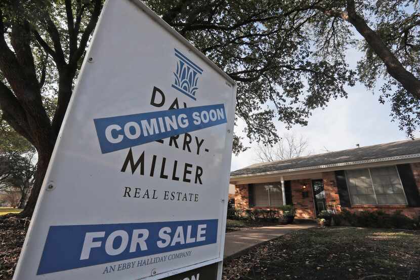 A coming soon sign sits in front of a home in Richardson.