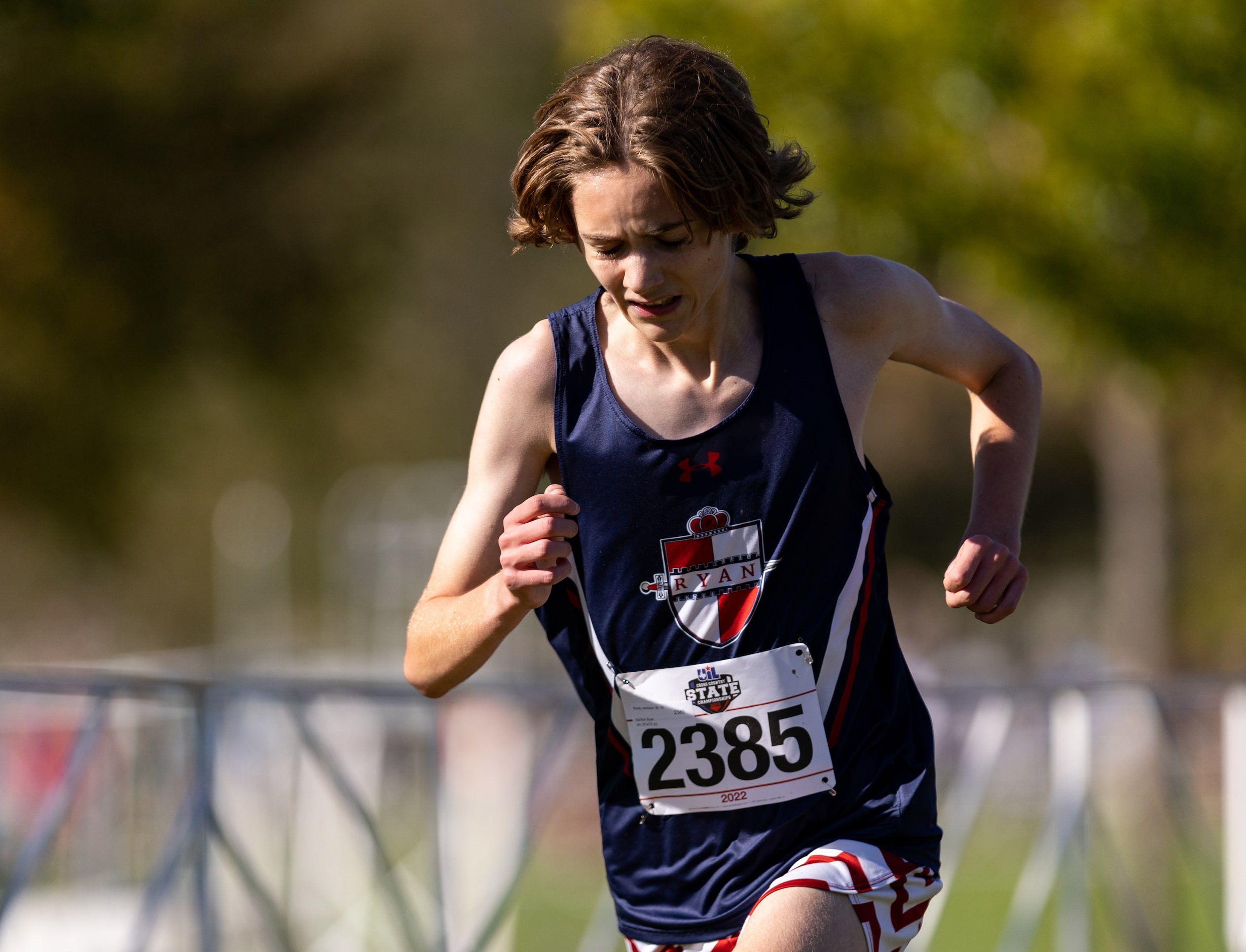 Brady Jackson of the Denton Ryan Raiders competes in the 5a boys’ 5k race during the UIL...