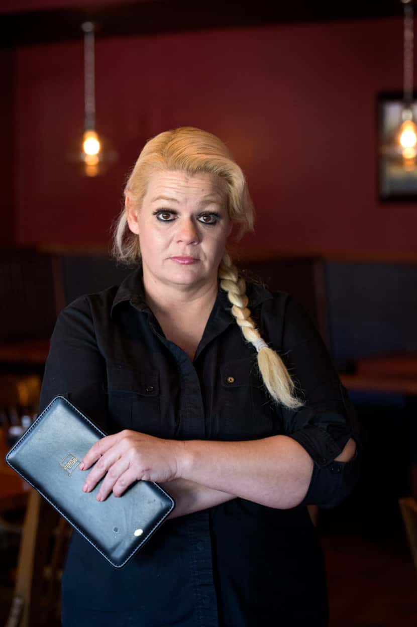 Christal Scott, a 43-year-old single mother and waitress, posed for a portrait in December...