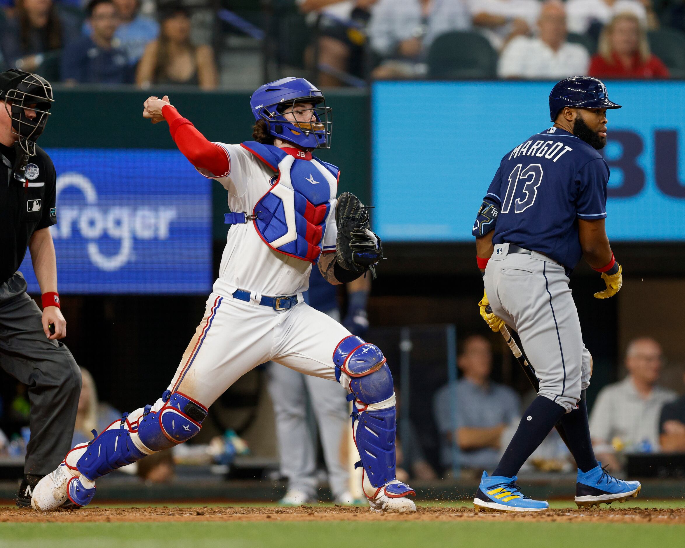 Rangers place Eli White on IL with wrist fracture, recall Leody