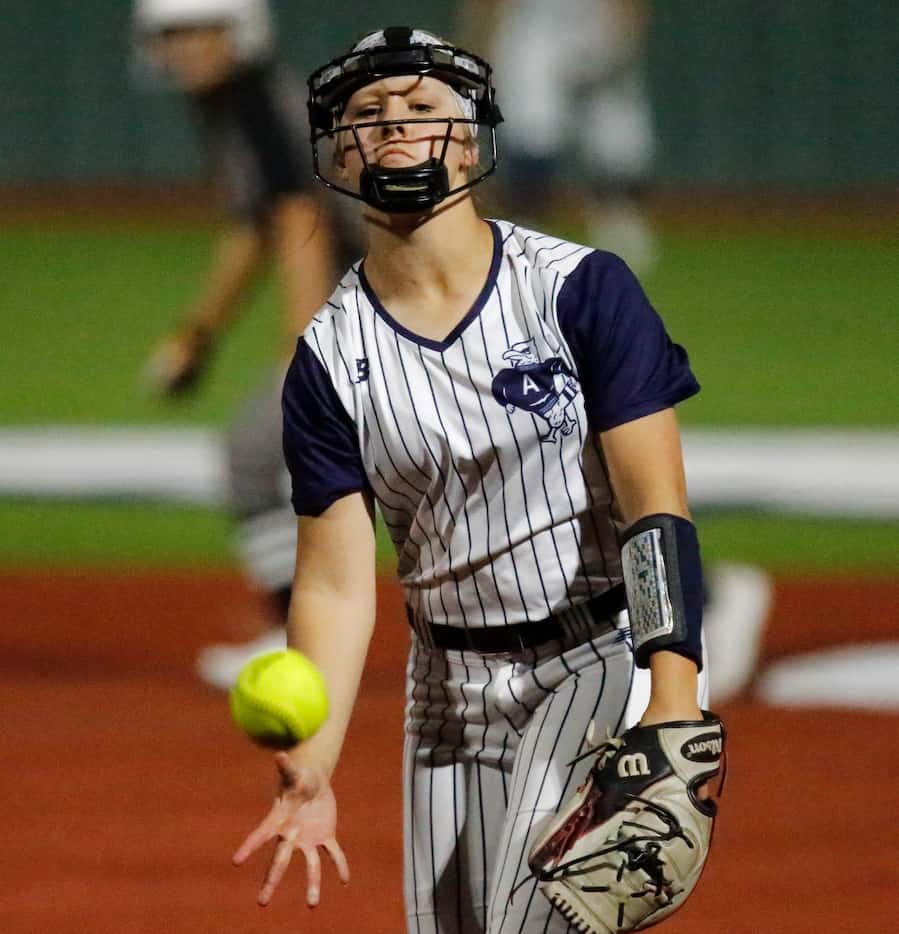 Allen High School pitcher Morgan Wright (2) delivers a pitch in the first inning as Allen...