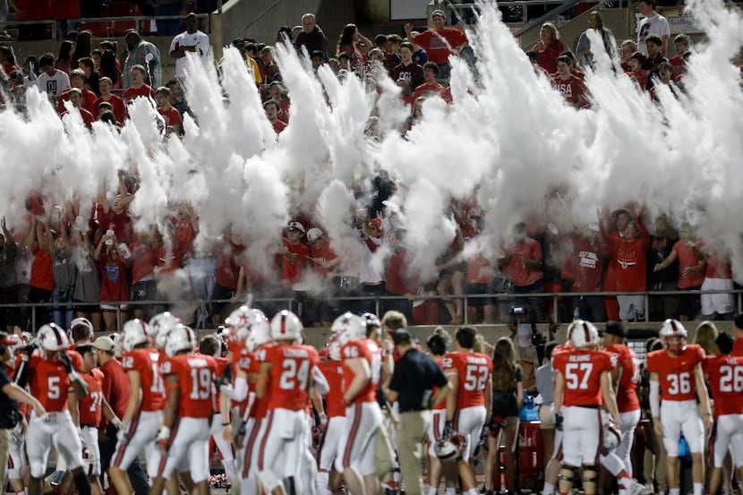 TXHSFB Coppell's student section uses baby powder to celebrate the start of the first half...