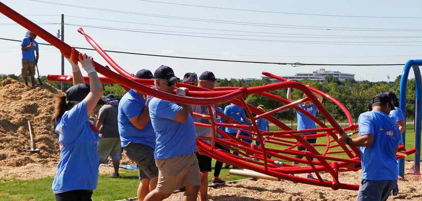 
Community volunteers helped build a playground at the La Academia de Estrellas. Dr Pepper...