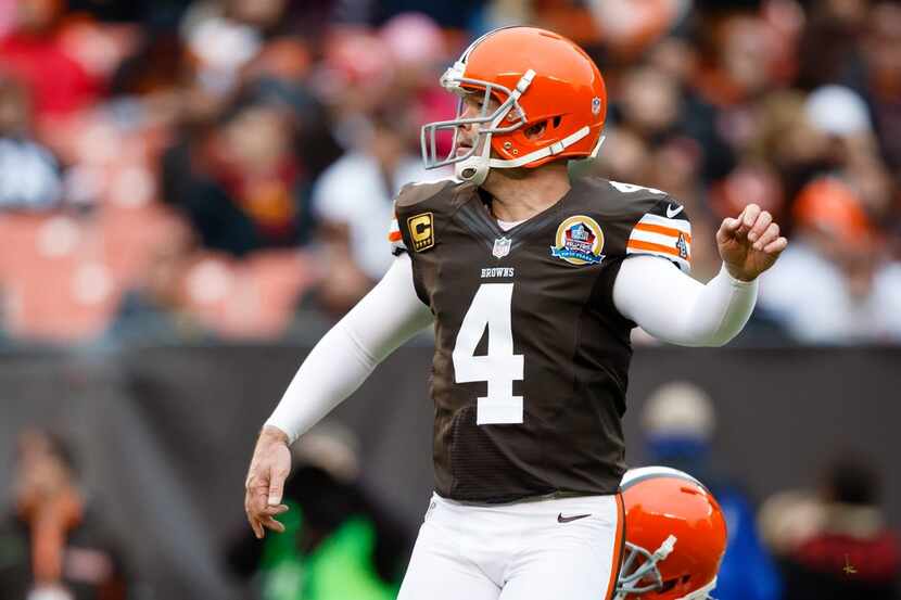 FILE - In this Dec. 9, 2012 file photo Cleveland Browns kicker Phil Dawson (4) kicks a field...