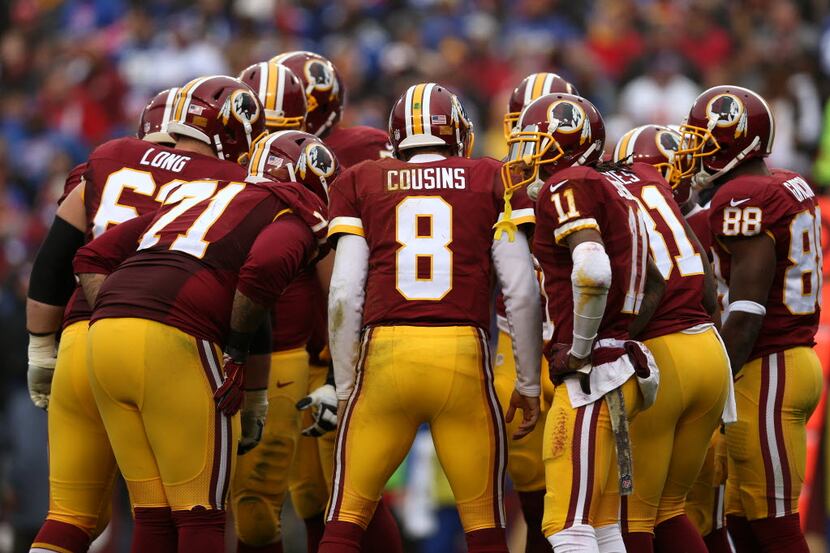 LANDOVER, MD - NOVEMBER 29: Quarterback Kirk Cousins #8 of the Washington Redskins talks in...