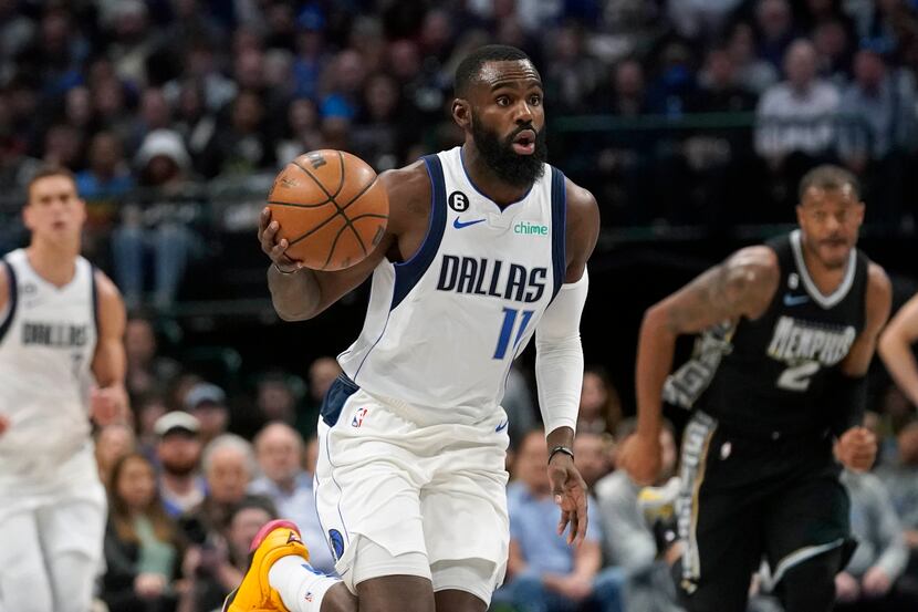 Dallas Mavericks forward Tim Hardaway Jr. (11) dribbles upcourt during the first quarter of...