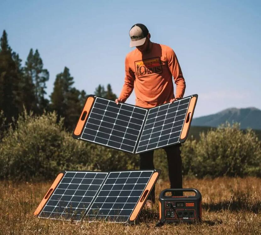 The Jackery SolarSaga 100 is rigid but foldable. You can connect four panels to the Explorer...