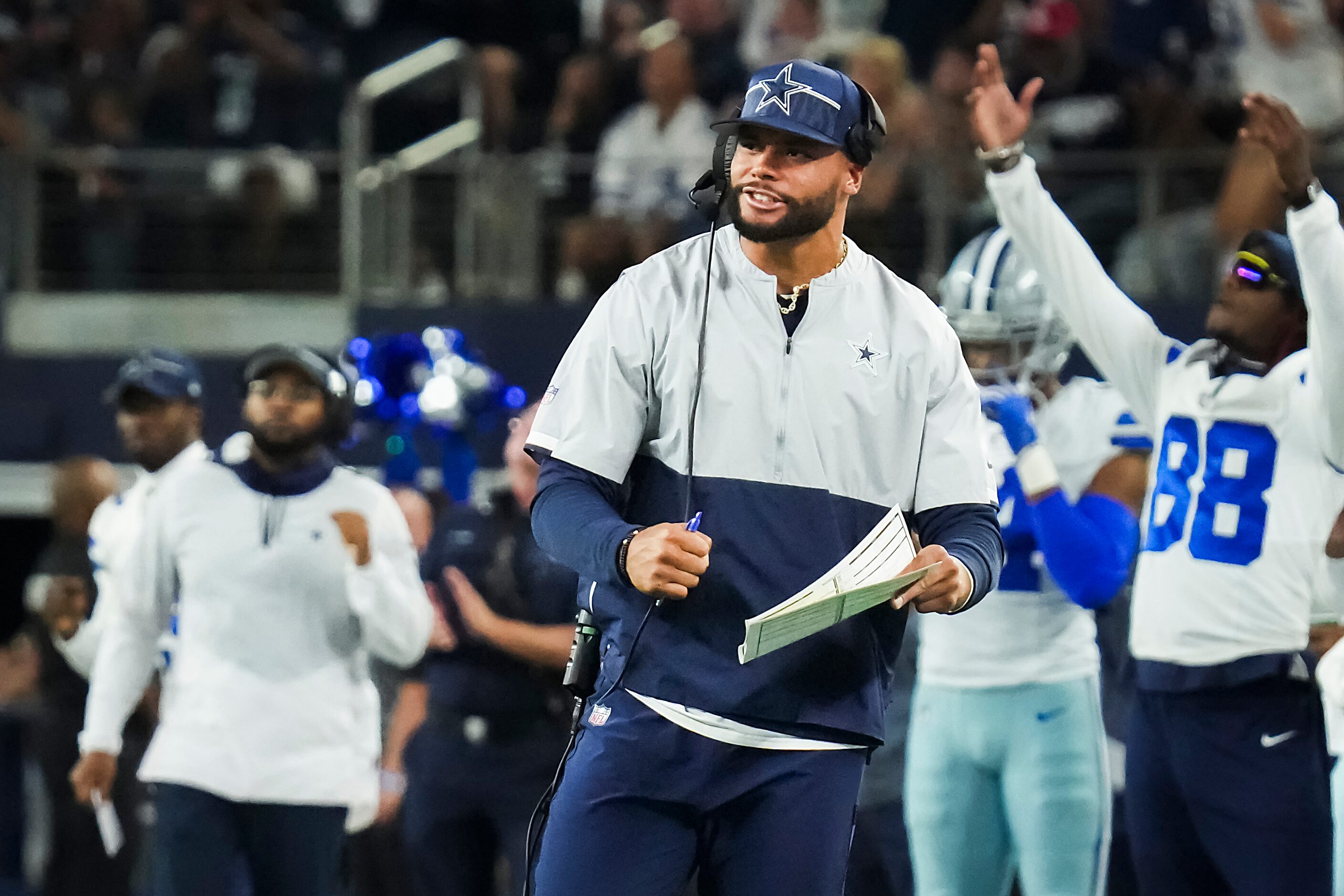 Dallas Cowboys quarterback Dak Prescott celebrates a touchdown  pass by quarterback Will...