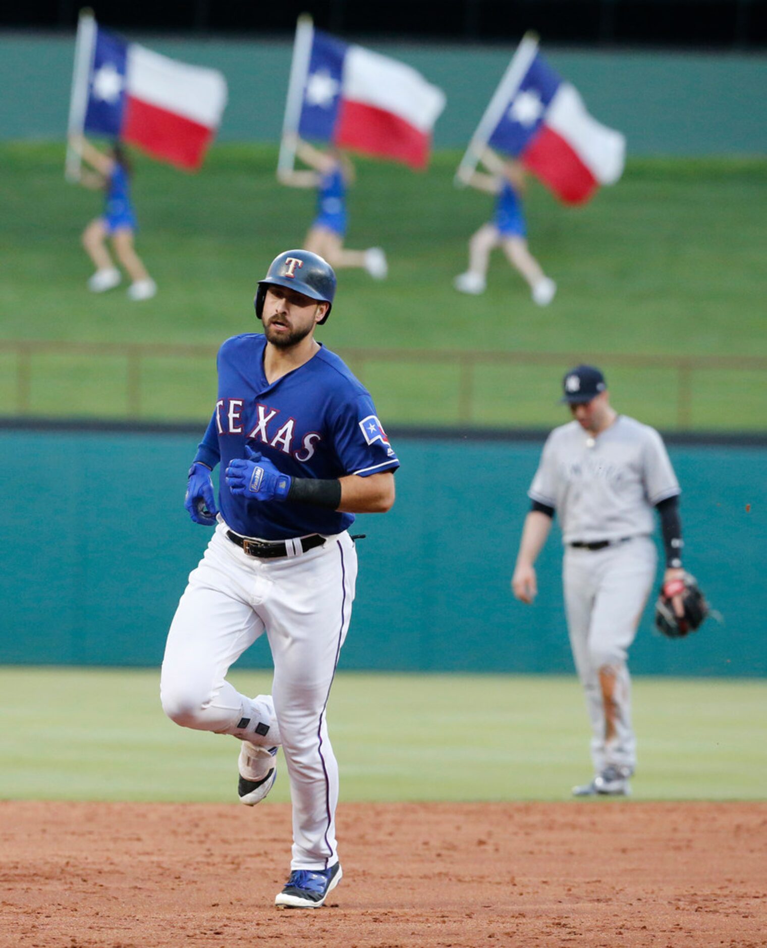 Texas Rangers left fielder Joey Gallo (13) rounds the bases on a home run in the second...