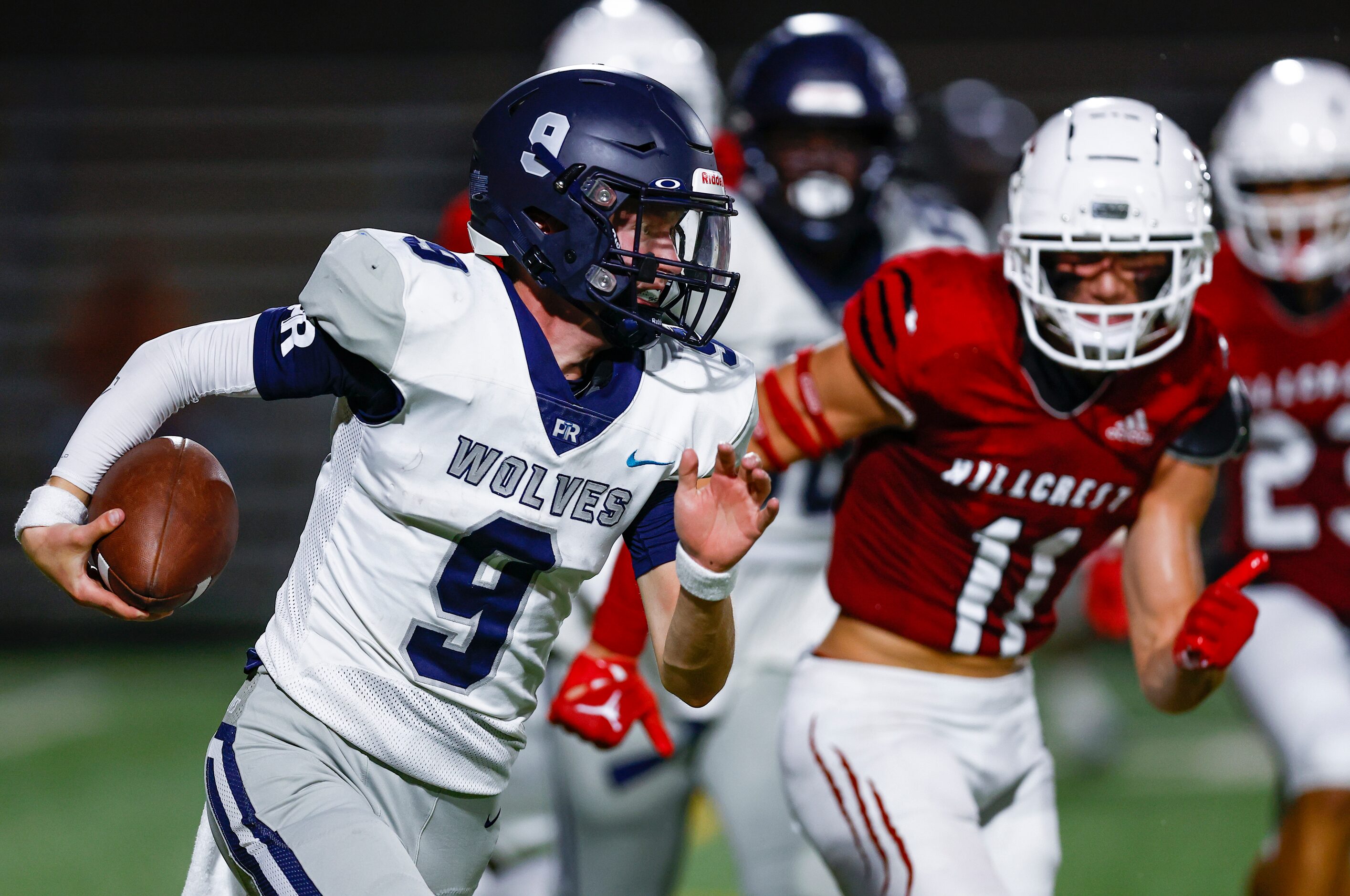 Carrollton Ranchview junior quarterback Andrew Erlenbusch (9) carries the ball during the...