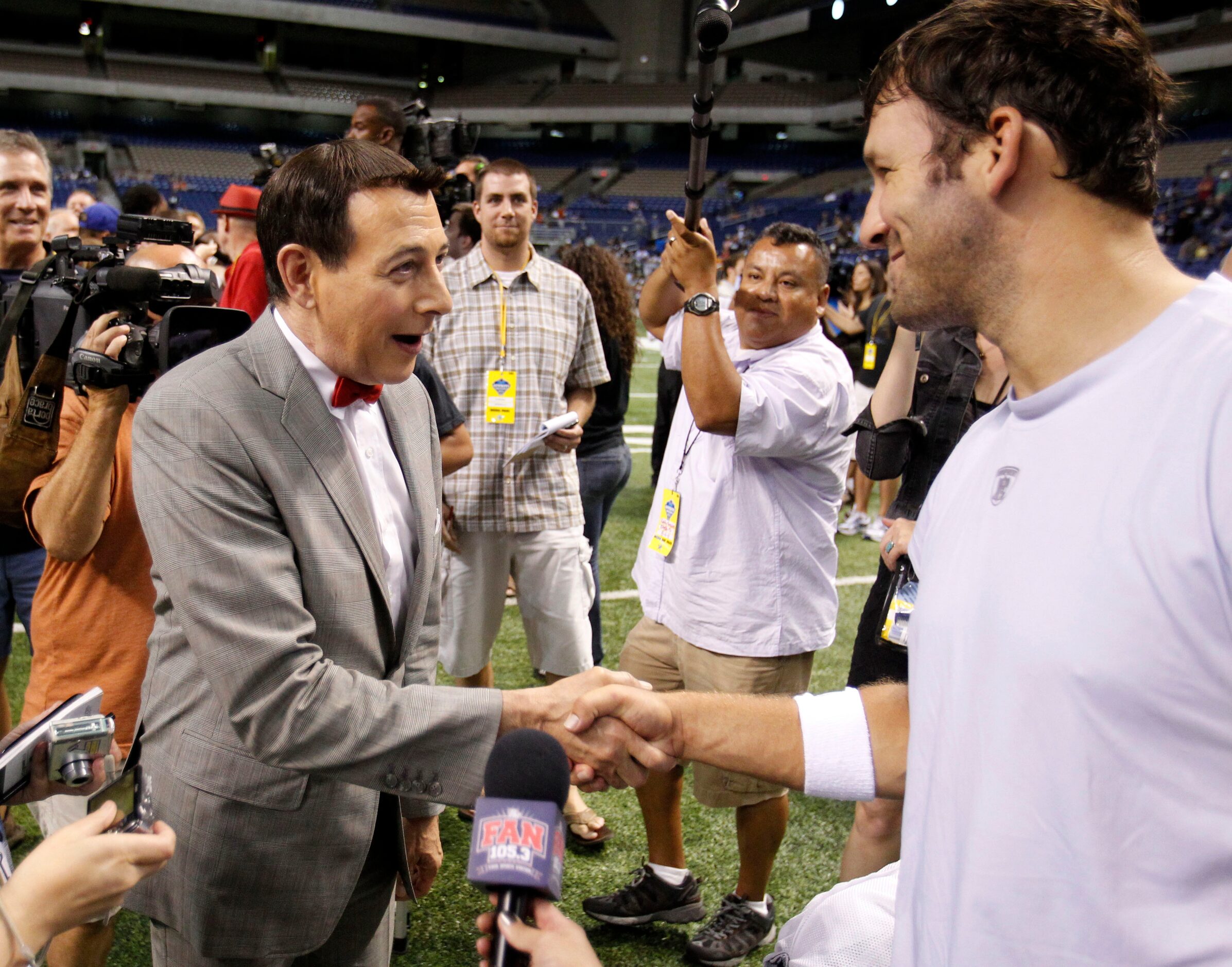 Entertainer Pee-wee Herman (Paul Reubens) meets Dallas Cowboys Tony Romo after the late...