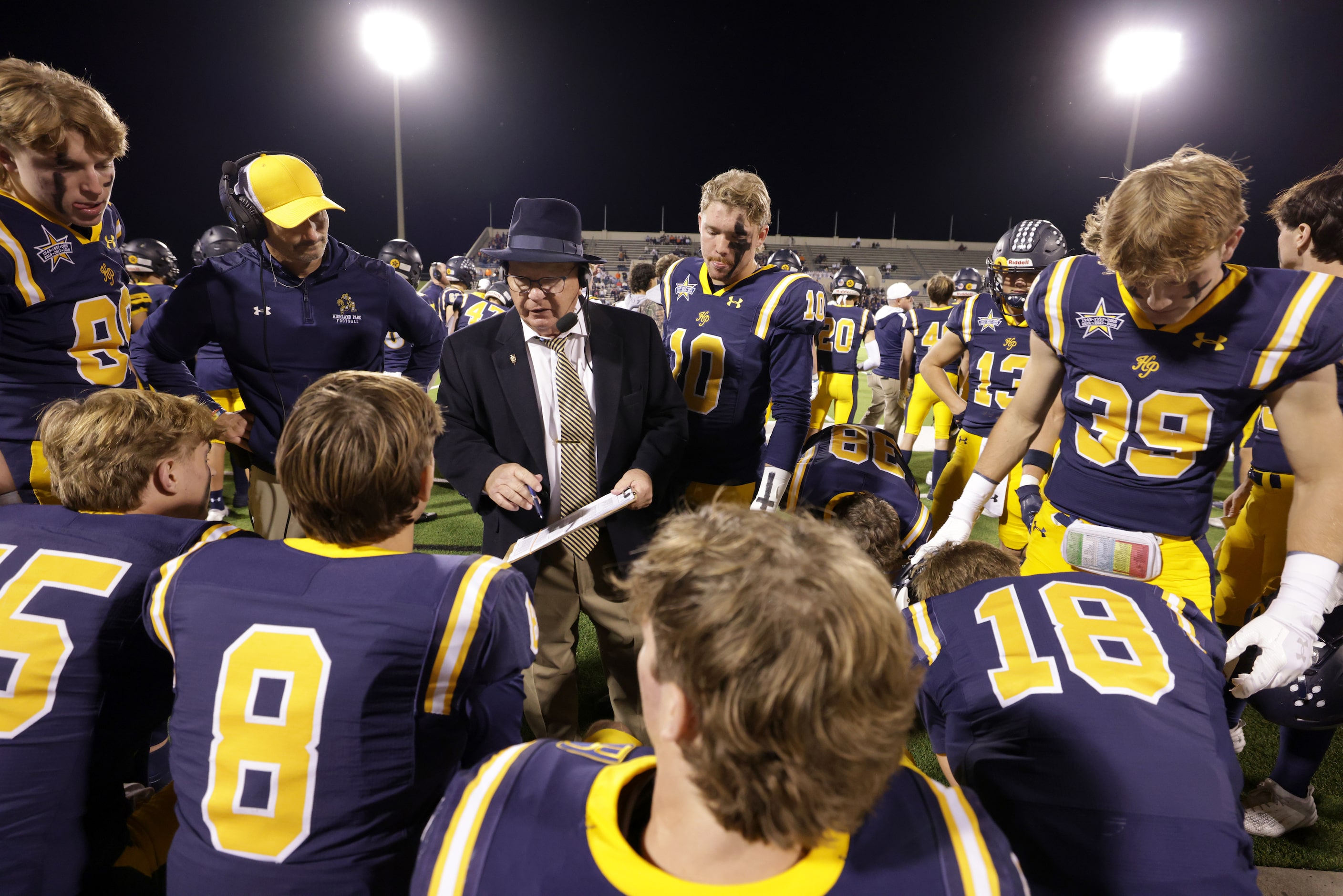 Highland Park huddles up in a football playoff game against Frisco Wakeland at Kimbrough...