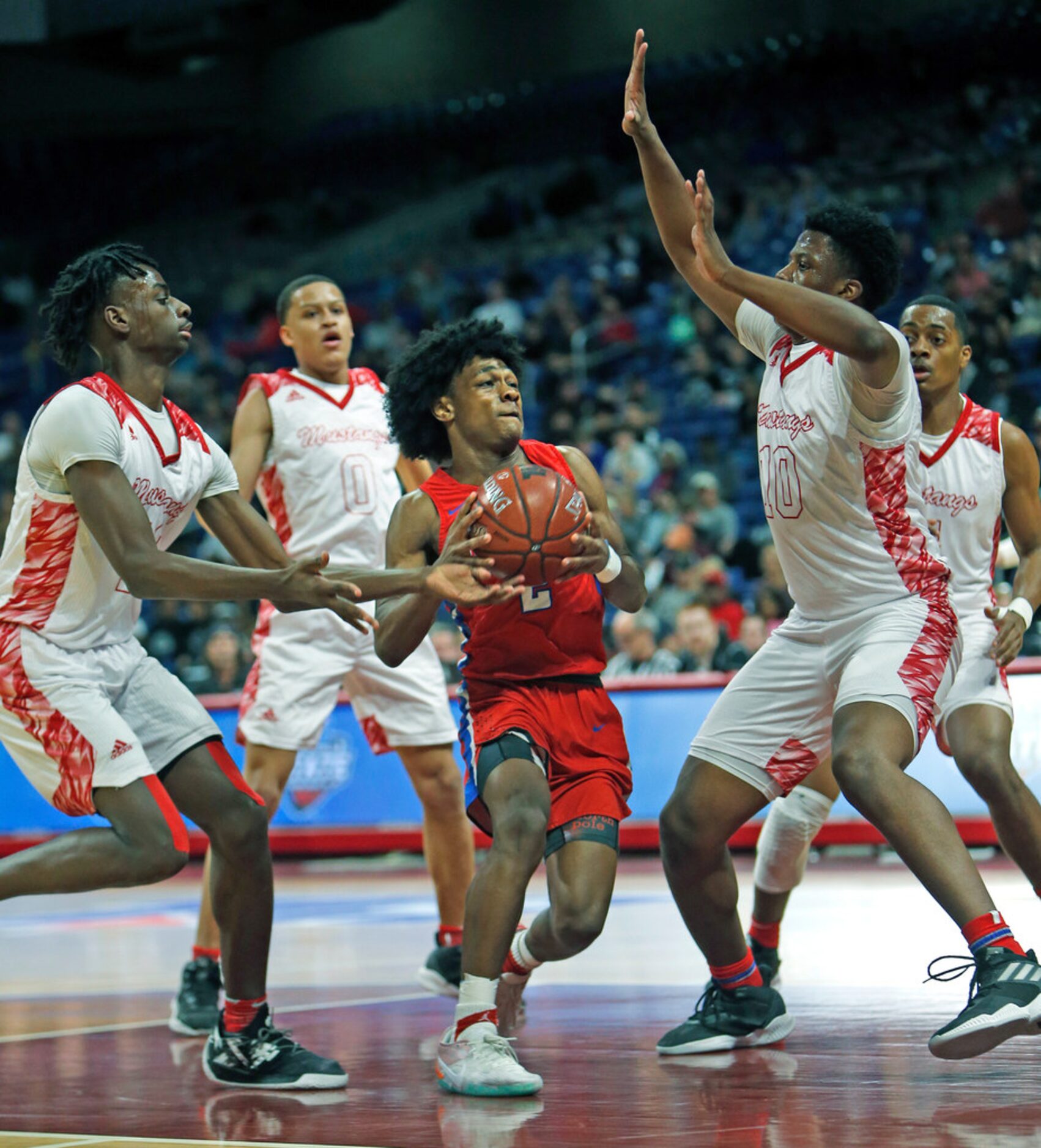 Duncanville's Ja'Bryant Hill #2 drives the lane. UIL boys basketball 6A State semi-final...