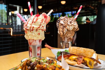 A Strawberry Shortcake, left, and Cookies n Cream Supreme shakes from Black Tap Craft...