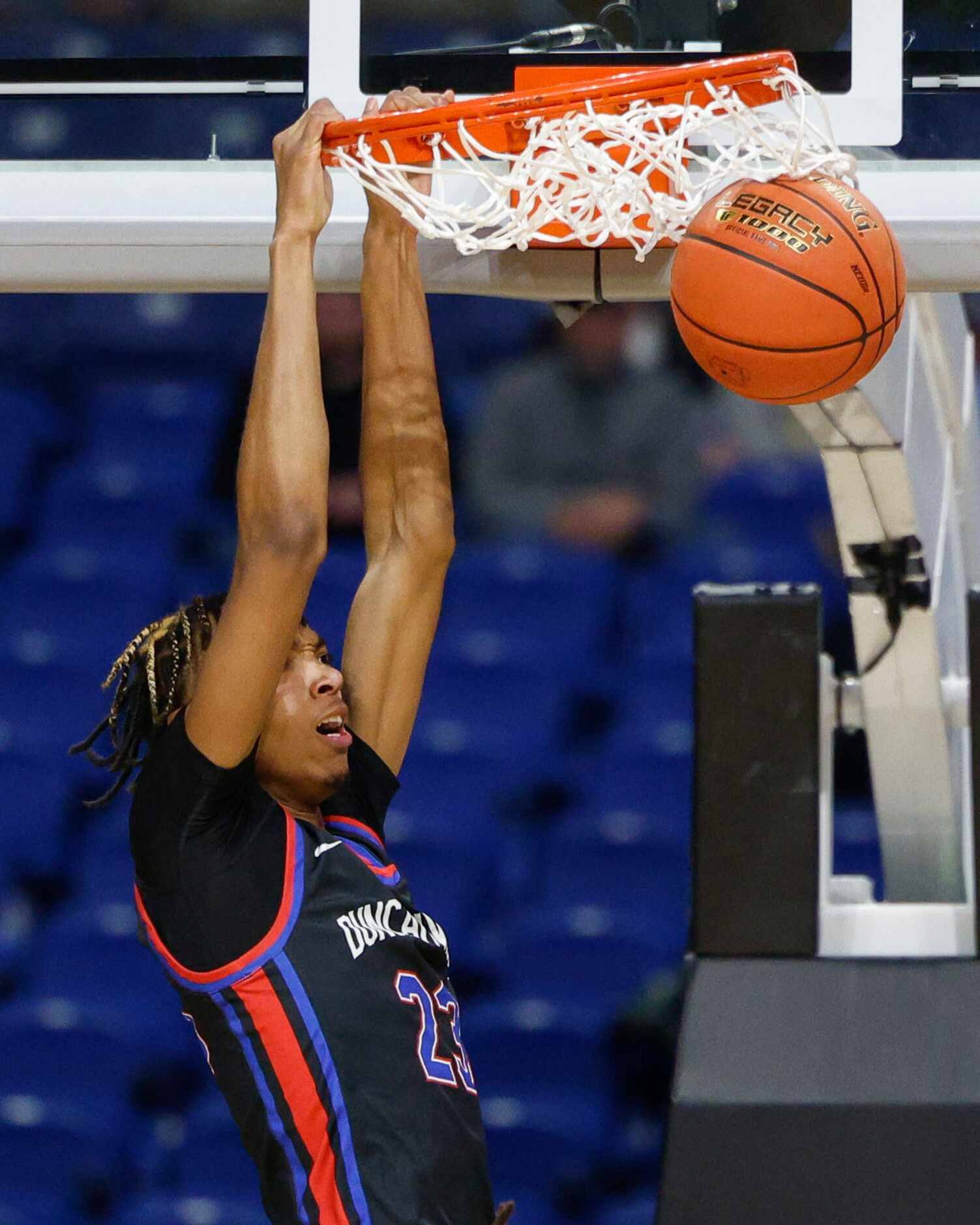 Duncanville forward Cameron Barnes (23) dunks the ball during the third quarter of the Class...