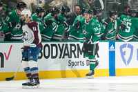 Dallas Stars center Roope Hintz (24) is congratulated for a goal, as Colorado Avalanche's...