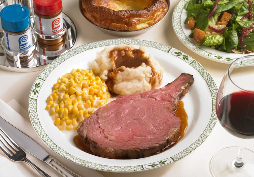 Lawry's famous prime rib with creamed corn and mashed potatoes is one of the restaurant's...