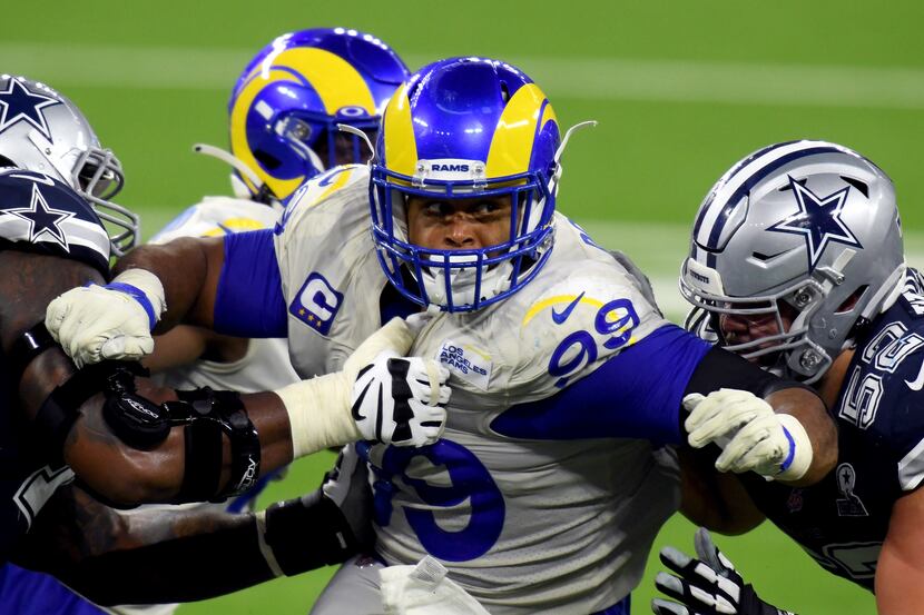 Aaron Donald #99 of the Los Angeles Rams rushes during a 20-17 win over the Dallas Cowboys...