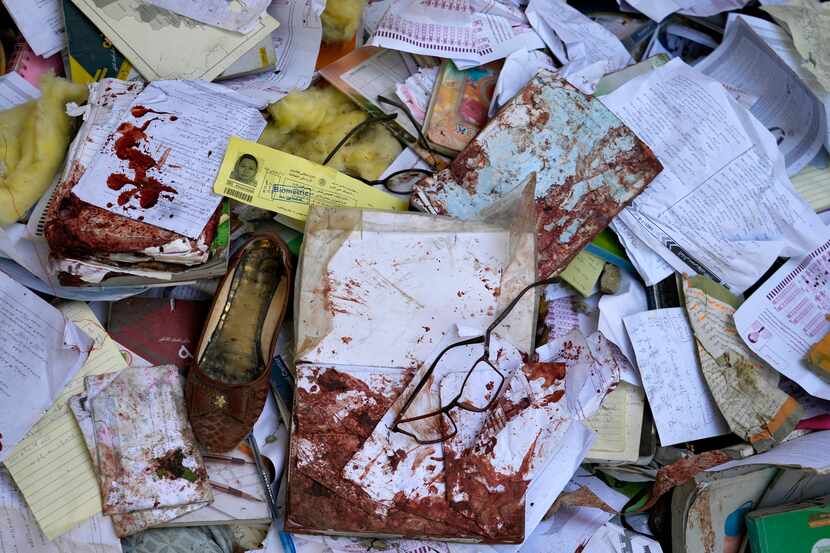 A view of the bloody books and supplies that left from Friday's suicide bomber attack on a...