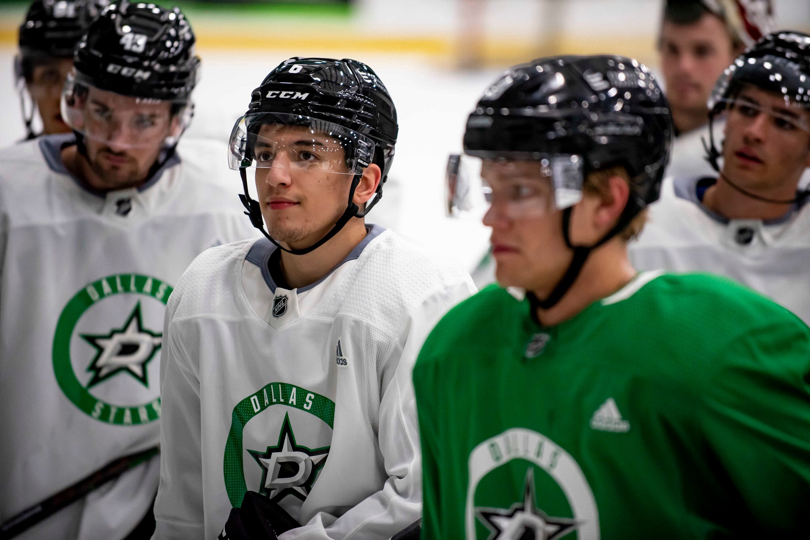 Defenseman Christian Kyrou (6) listens to instructions for the next drill during the 2022...