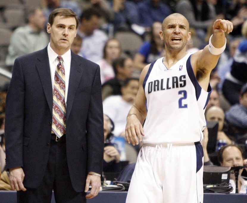 Dallas Mavericks head coach Rick Carlisle and Jason Kidd (2) during a break in play in a...