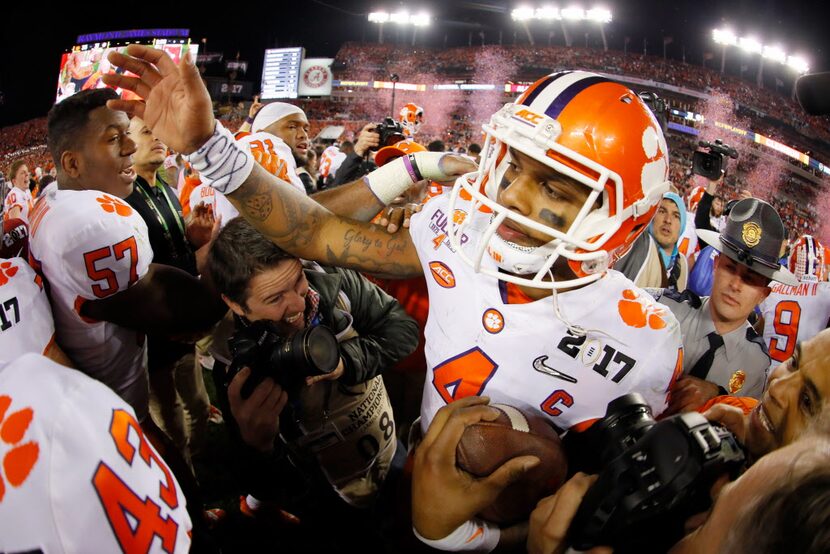 TAMPA, FL - JANUARY 09:  Quarterback Deshaun Watson #4 of the Clemson Tigers reacts after...