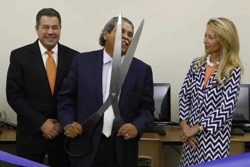 Former DISD superintendent Michael Hinojosa (center) and Lynn McBee, CEO of the Young...