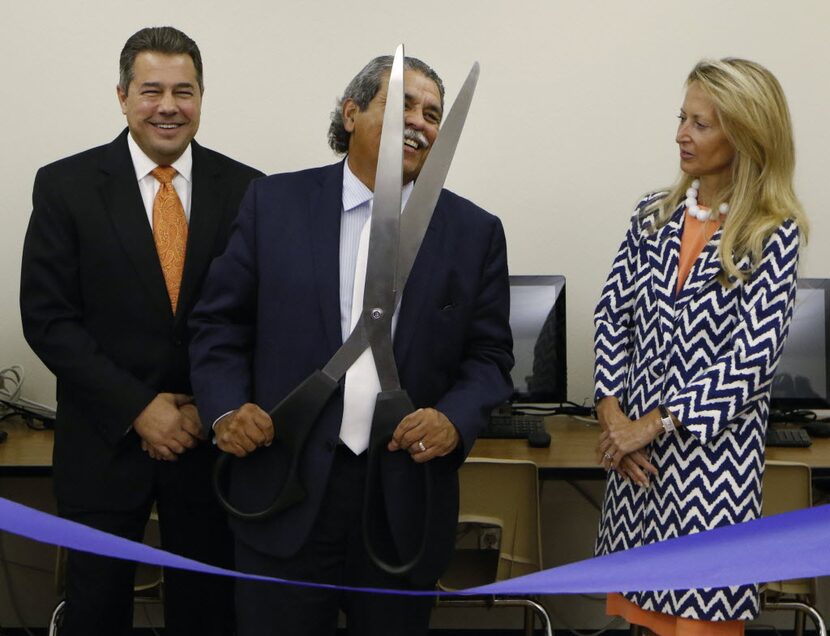 Juan Fontanes (left), CIO of NEC, DISD superintendent Michael Hinojosa and and Lynn McBee,...