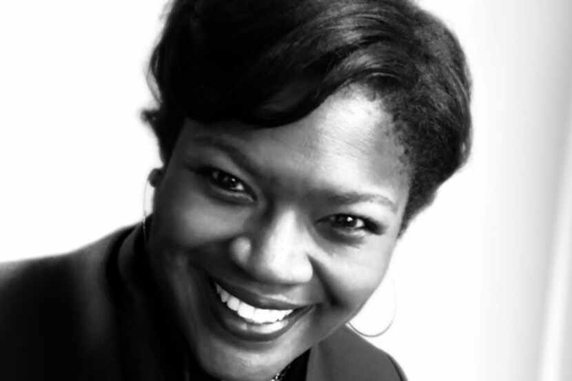 A black and white image of Benaye Rogers, the new president and CEO of Crossroads Community...