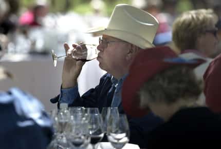 Cowboys drinking wine: that's Perini Ranch.