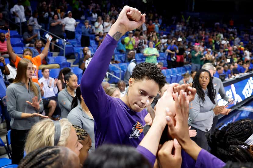 Phoenix Mercury center Brittney Griner pumps her fist as she’s introduced to the crowd...