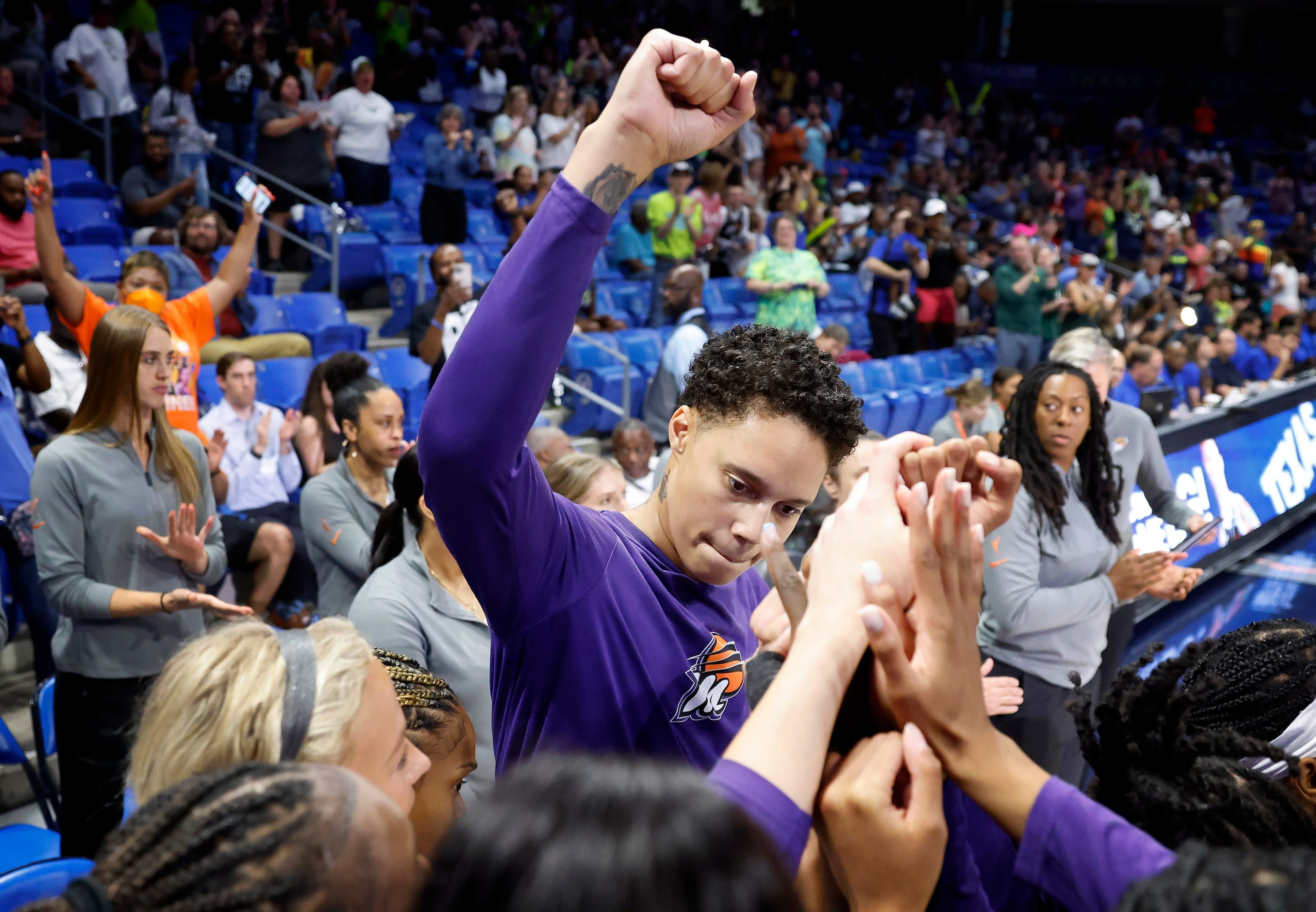 Phoenix Mercury center Brittney Griner pumps her fist as she’s introduced to the crowd...