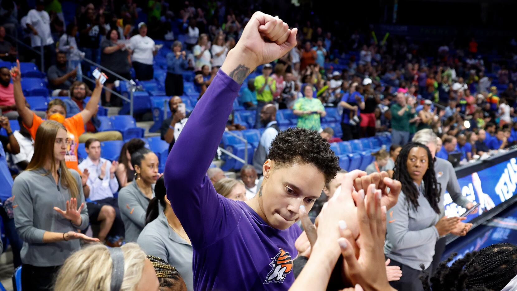 Phoenix Mercury center Brittney Griner pumps her fist as she’s introduced to the crowd...