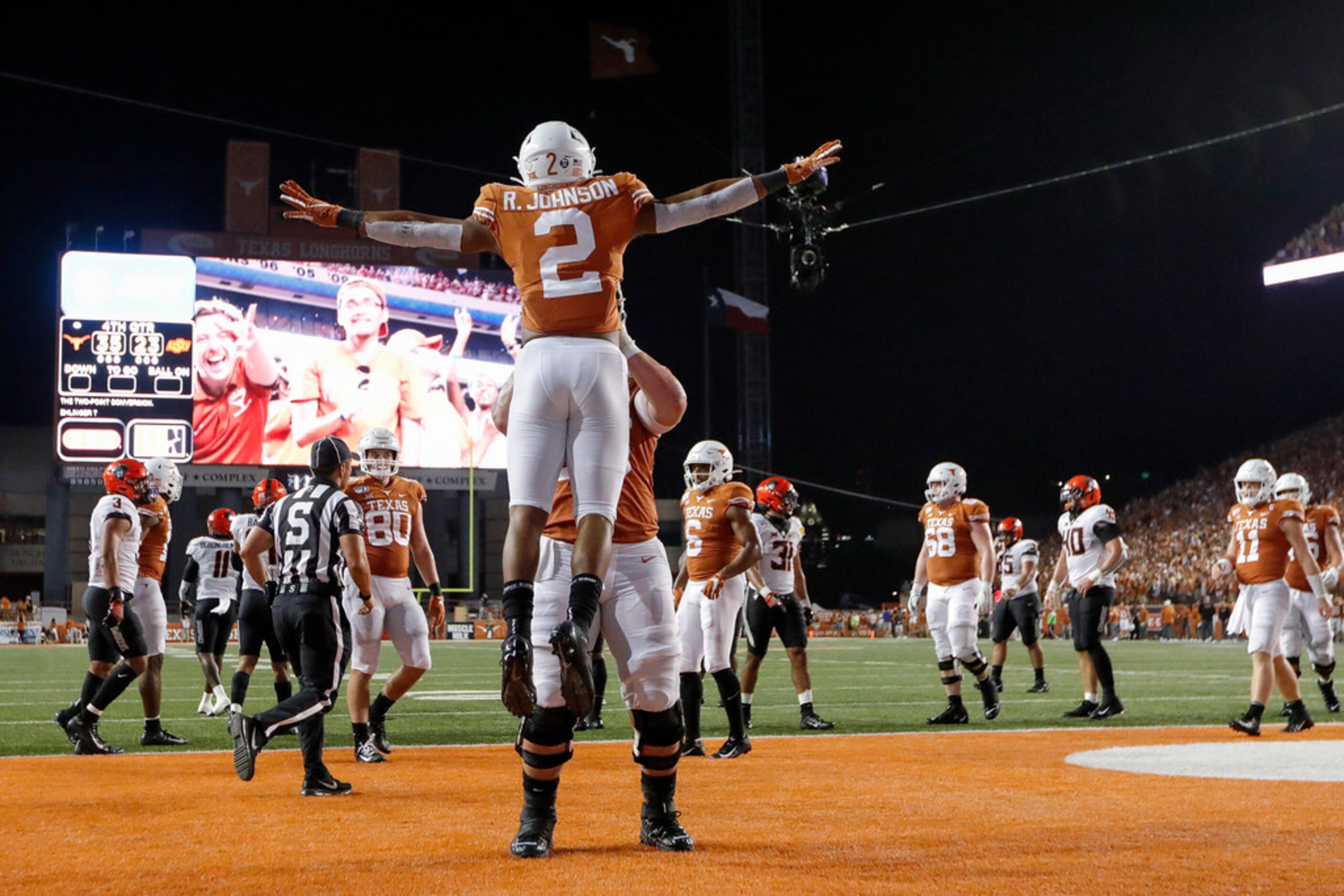 AUSTIN, TX - SEPTEMBER 21:  Zach Shackelford #56 of the Texas Longhorns lifts Roschon...