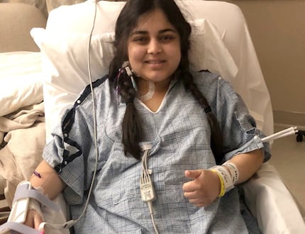 Neelam Bohra gave a thumbs-up after receiving a new kidney at a Fort Worth hospital in March. 