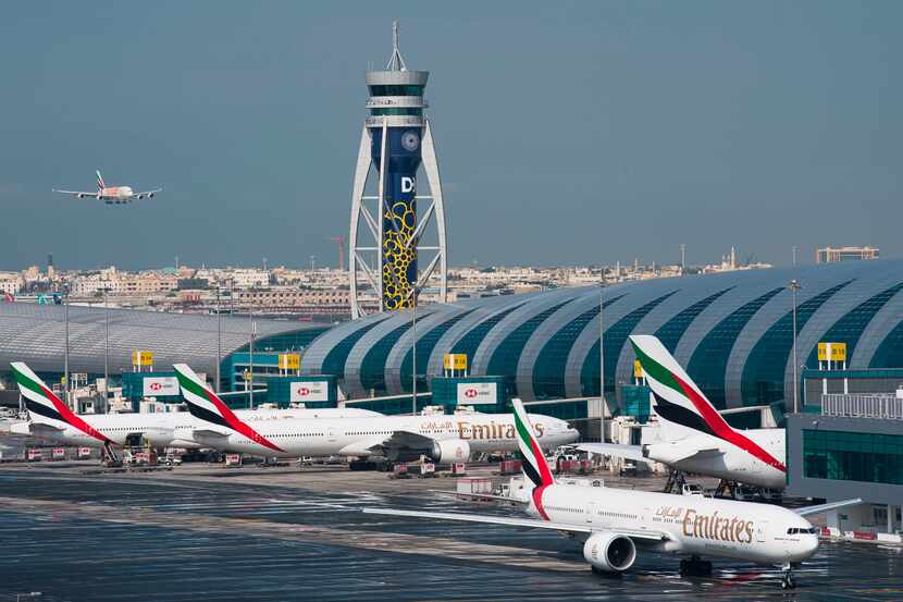 An Emirates jetliner comes in for landing at Dubai International Airport in Dubai, United...