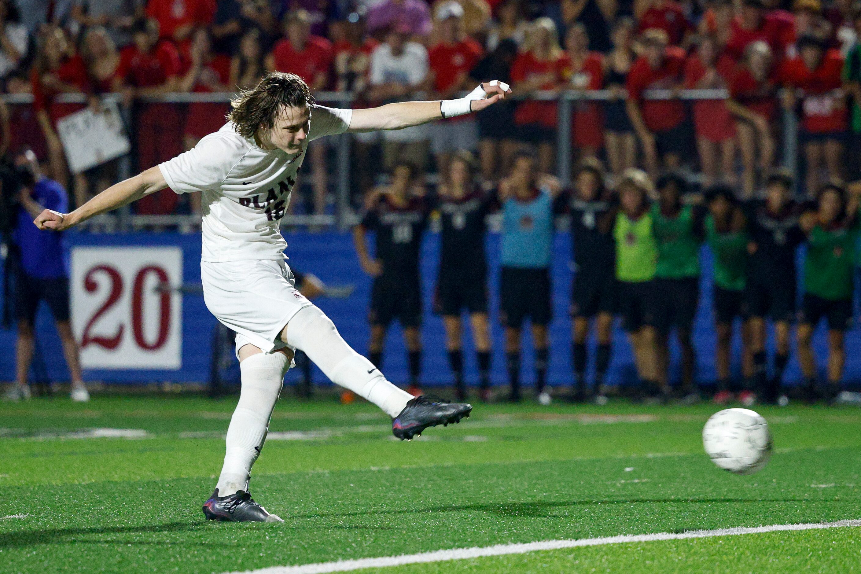 Plano forward Nolan Giles (16) converts on a penalty kick during a shootout in the Class 6A...