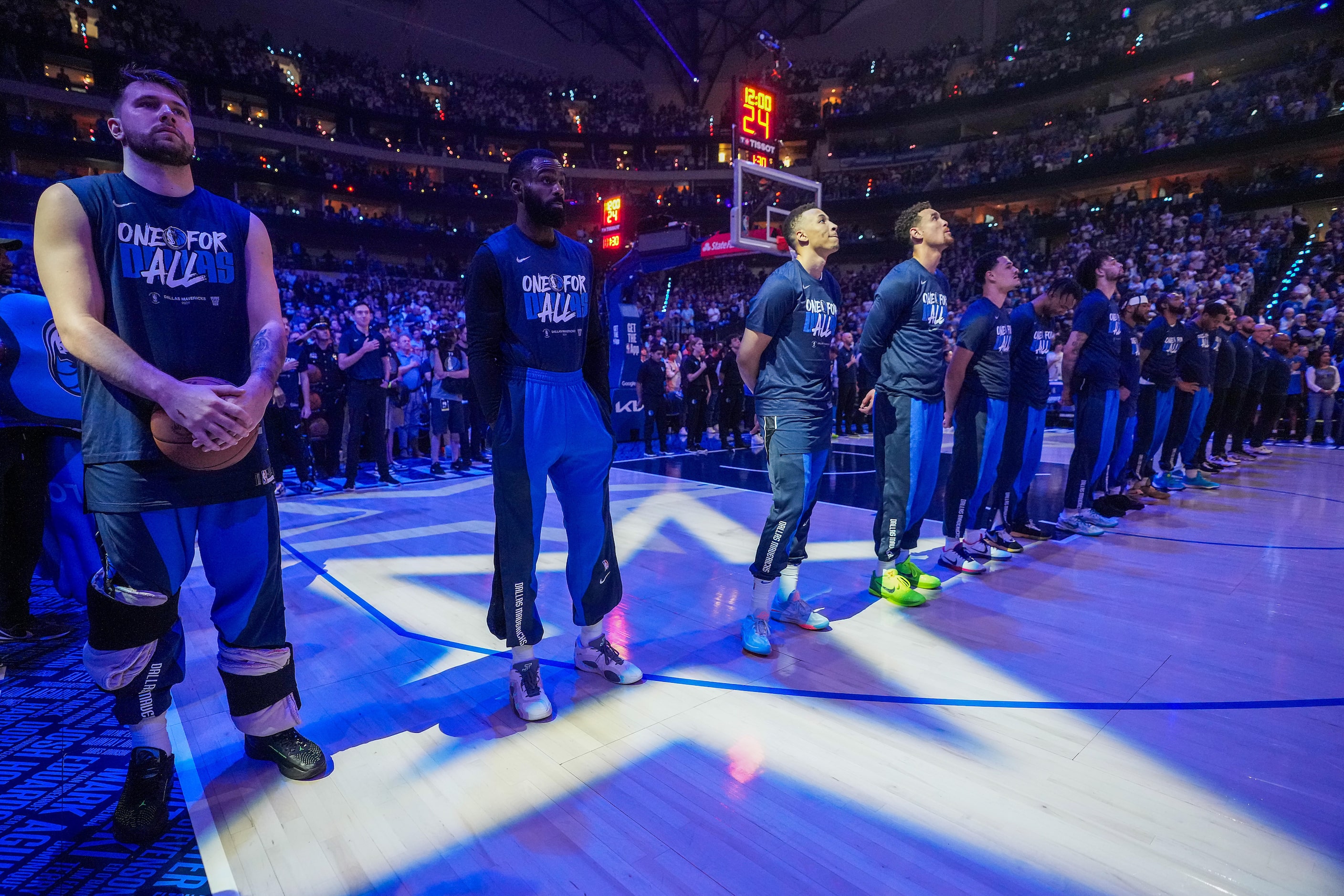 Dallas Mavericks guard Luka Doncic (from left), forward Tim Hardaway Jr. (10), guard Dante...