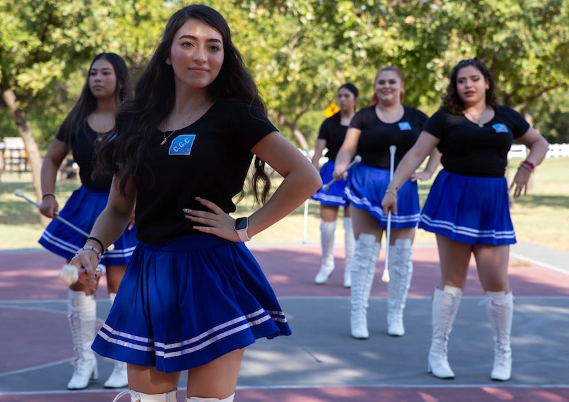 Comite Civico Centroamericano cheerleader Katherine Blanco (left) practices at Trinity River...