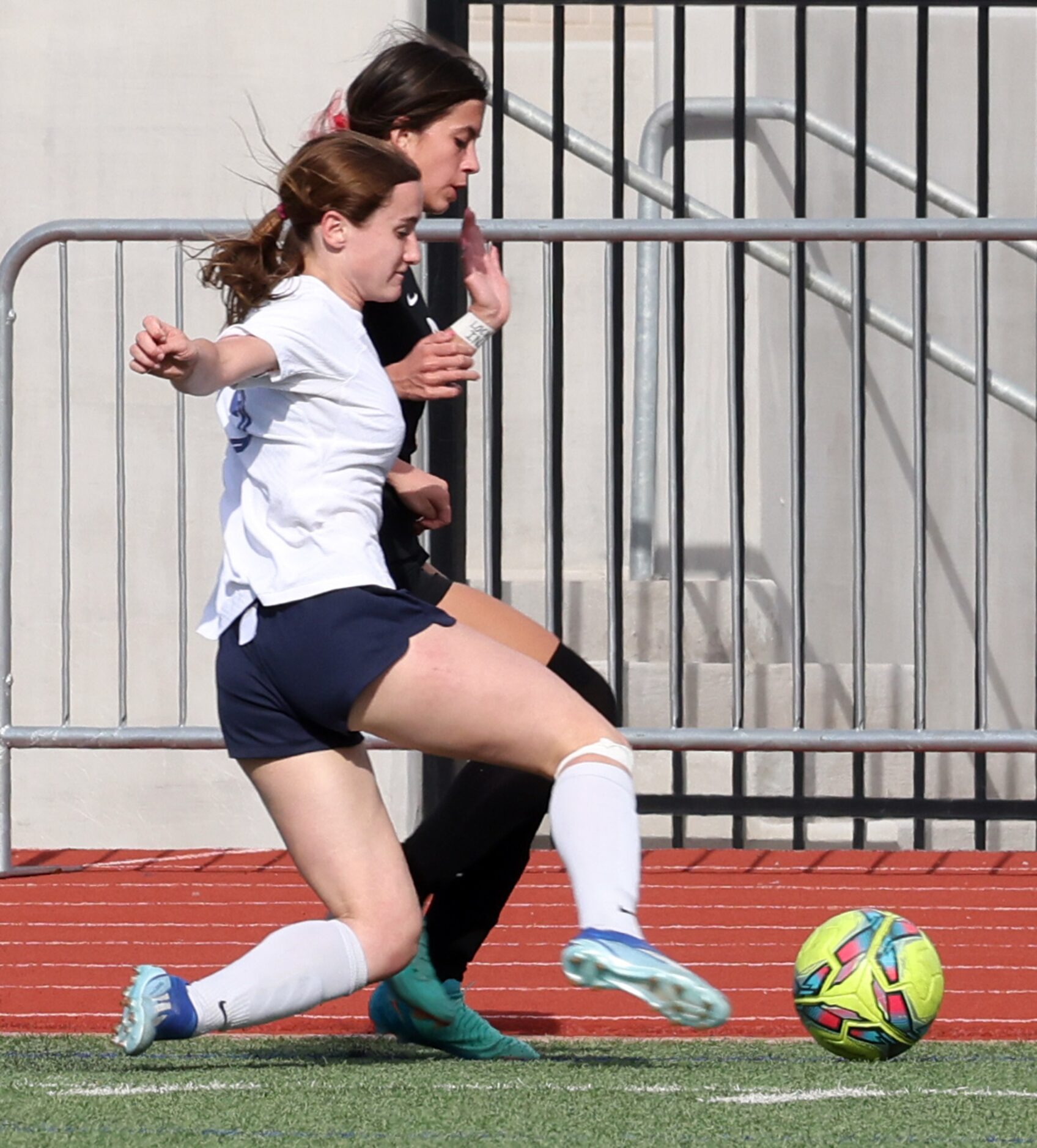 Richardson JJ Pearce player Kyra Palermo (19), foreground, and Flower Mound Marcus forward...