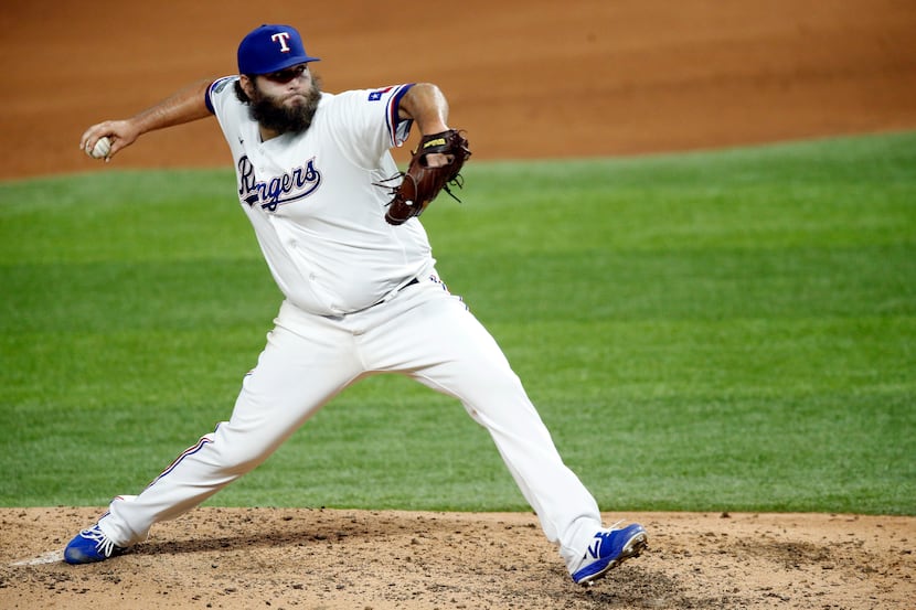 Texas Rangers starting pitcher Lance Lynn (35) throws against the Oakland Athletics during...