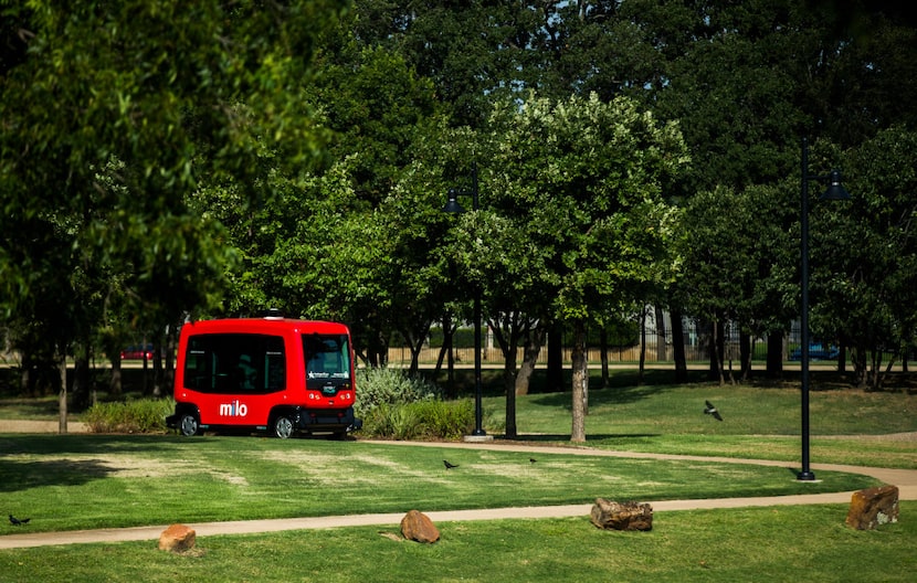 Driverless vehicle Milo follows a predetermined path during a demonstration Friday at Globe...