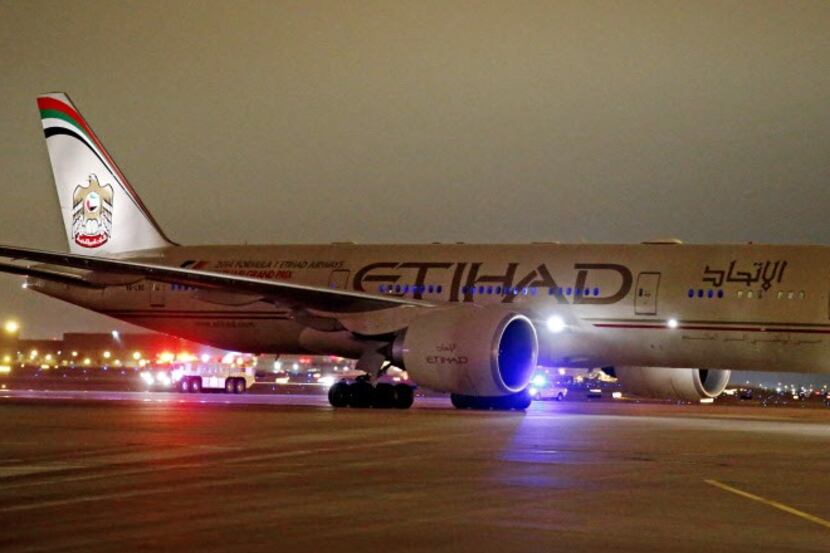  An Etihad Airways Boeing 777-200 arrives Dec. 3 at Dallas/Fort Worth International Airport,...