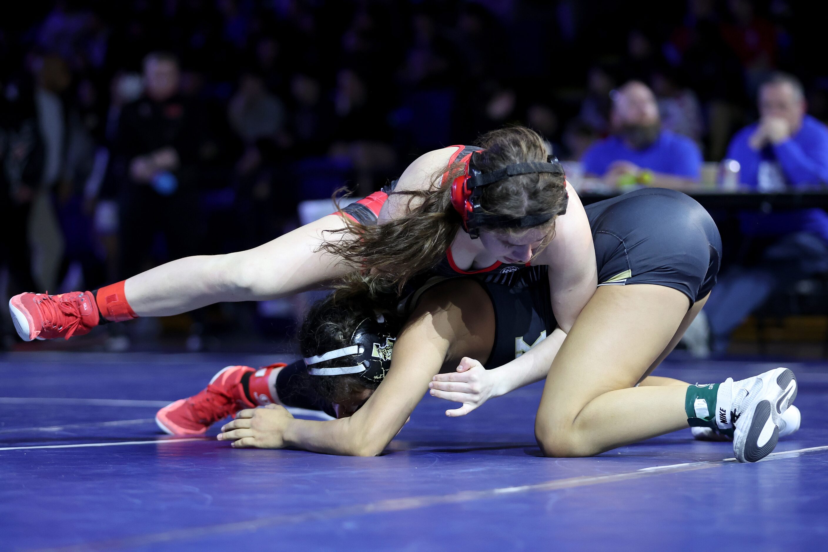 Akeelah Moore of Melissa (red) competes against Madison Pena of Lubbock in the Girls 5A...