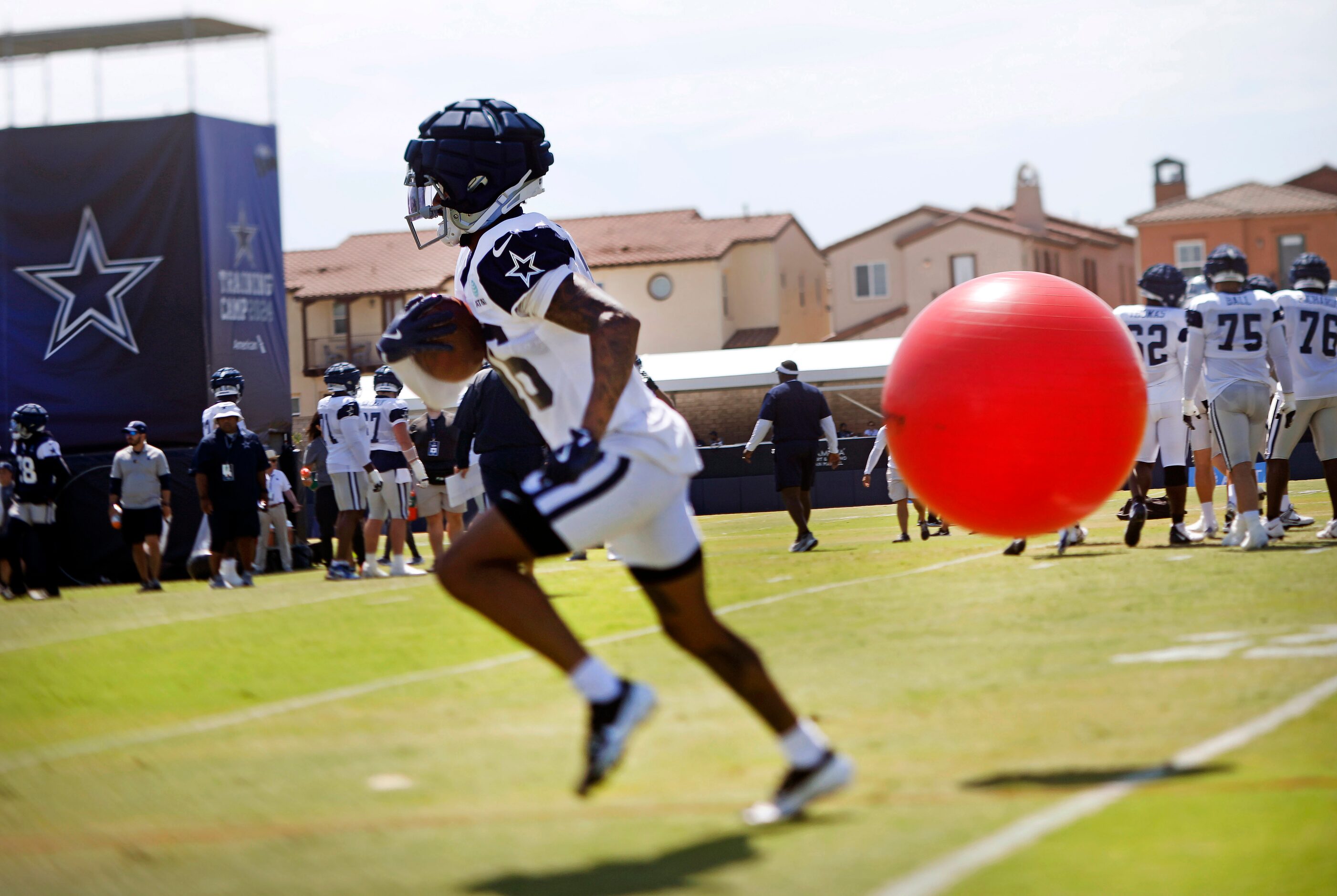 Dallas Cowboys wide receiver Jalen Moreno-Cropper (16) dodges a bouncing exercise ball...