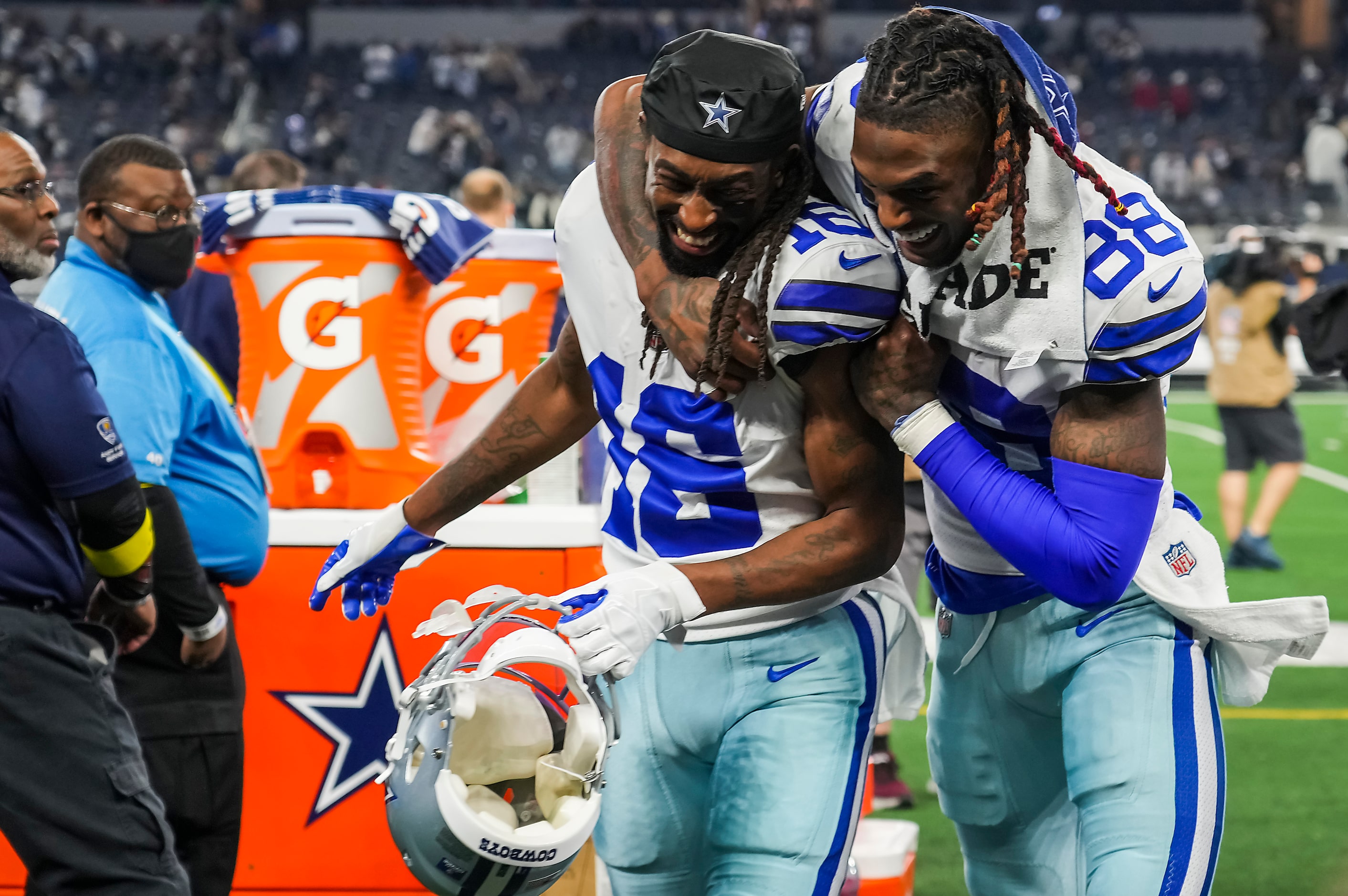 Dallas Cowboys wide receiver CeeDee Lamb (88) celebrates with wide receiver T.Y. Hilton (16)...