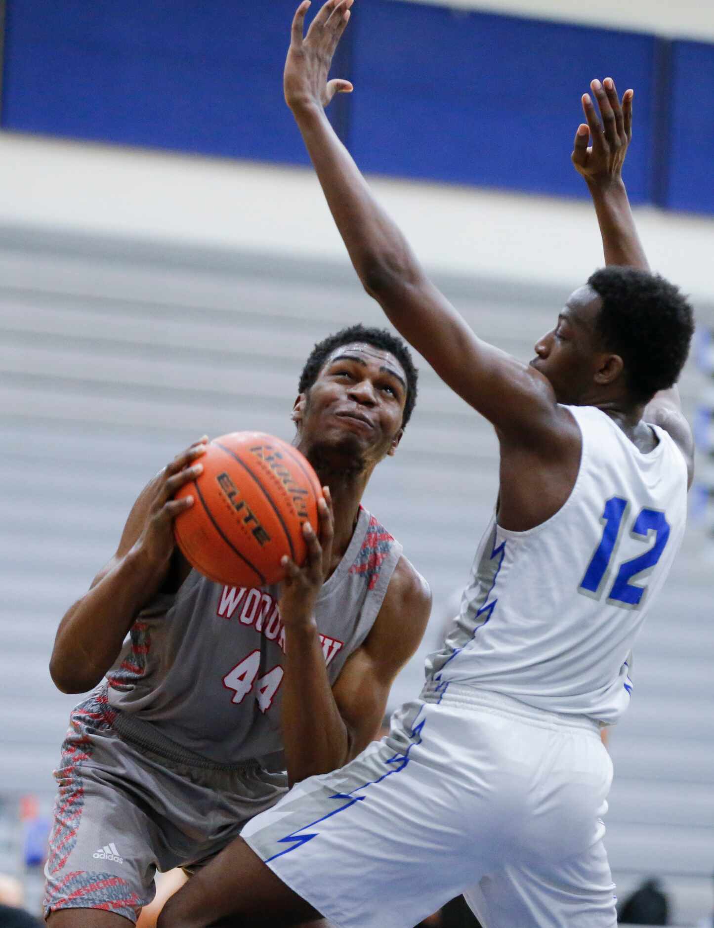 Woodrow Wilson sophomore forward Isaac Onuoha (44) attempts a shot as Conrad senior forward...