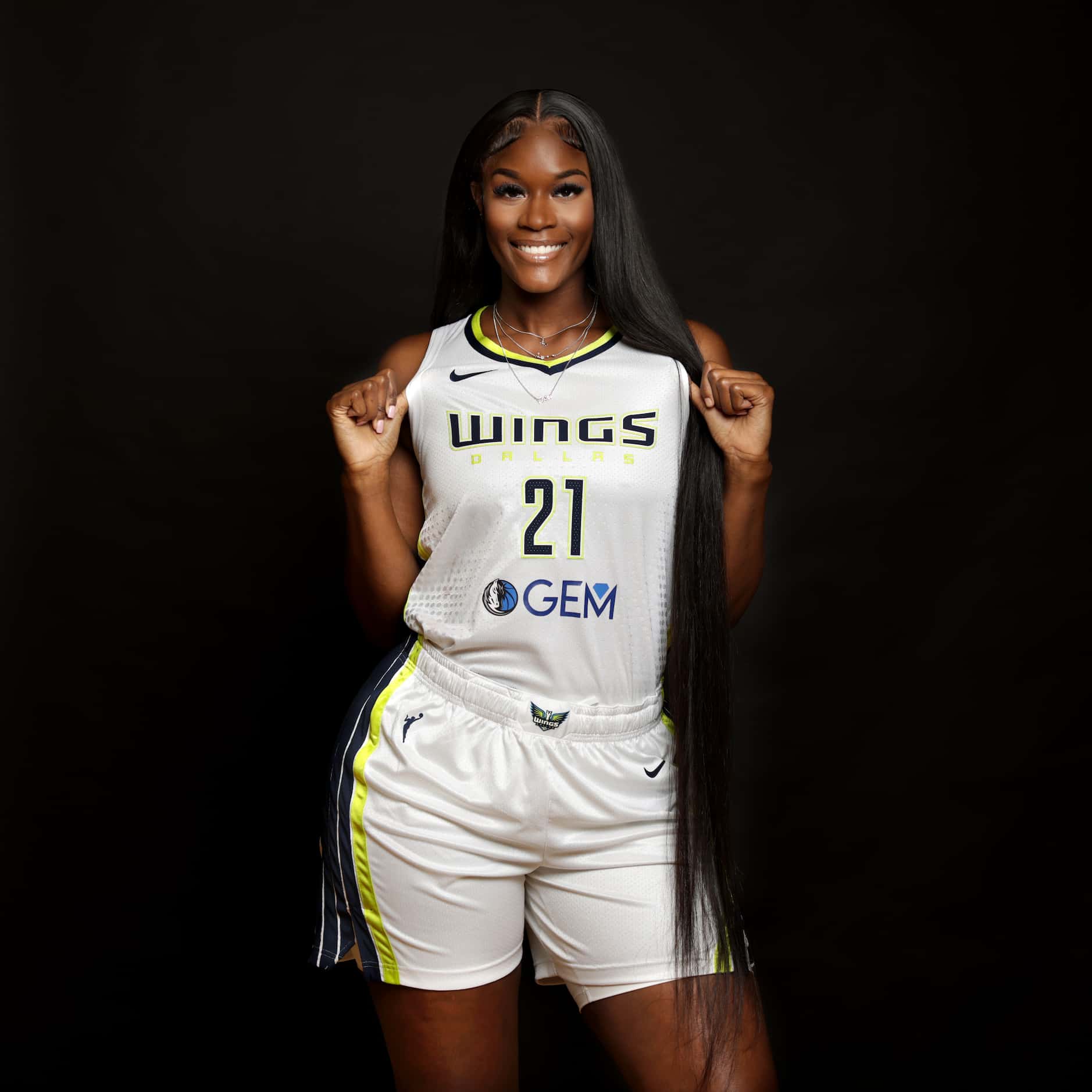 #21 Kalani Brown with The Dallas Wings poses for a photograph at College Park Center in...