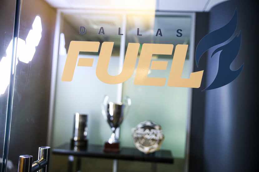 Gaming awards are seen through the entryway to the Team Envy and Dallas Fuel office space...