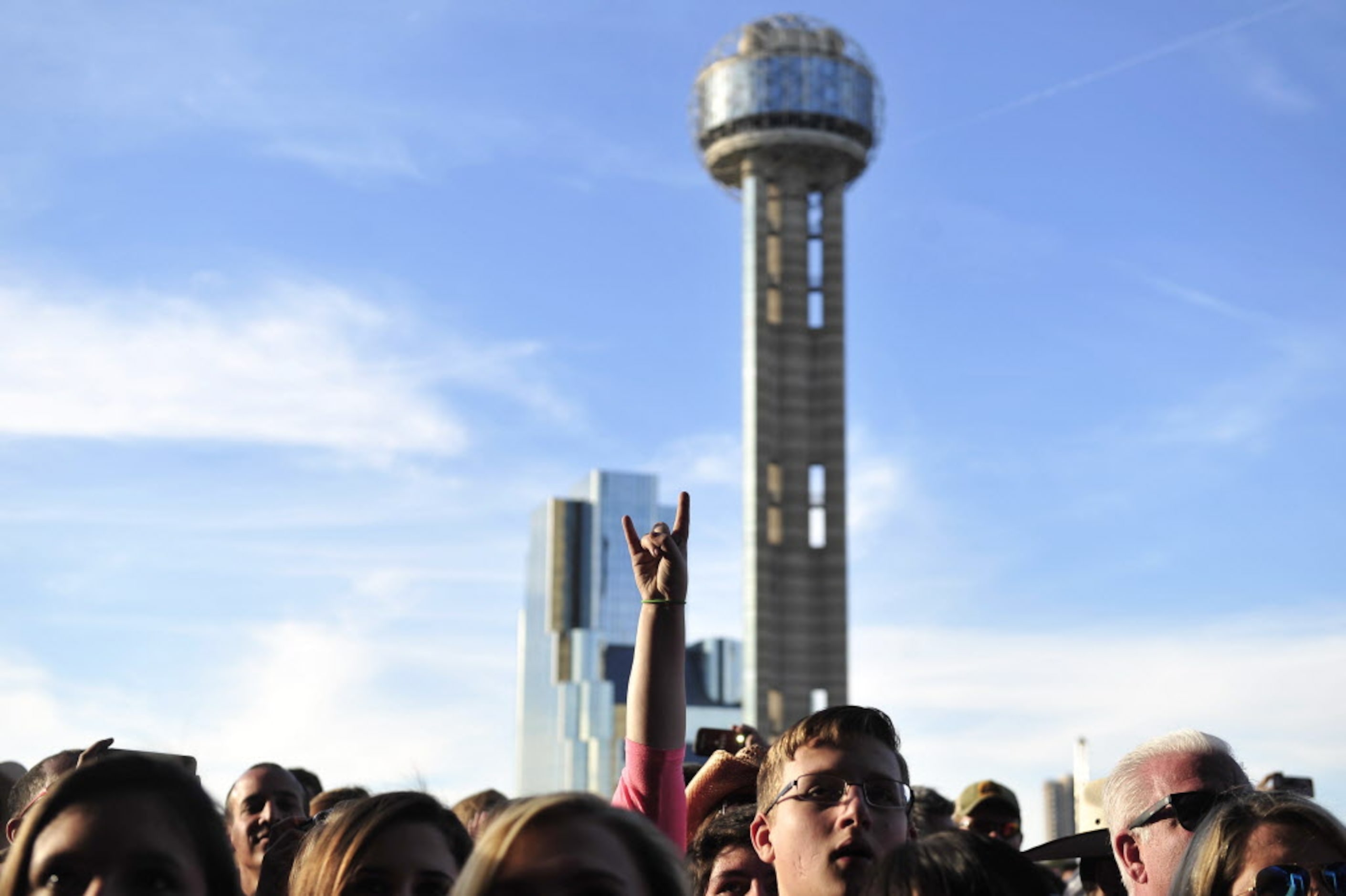 A fan sticks up a rock sign at the 2014 NCAA March Madness Music Festival during the NCAA...